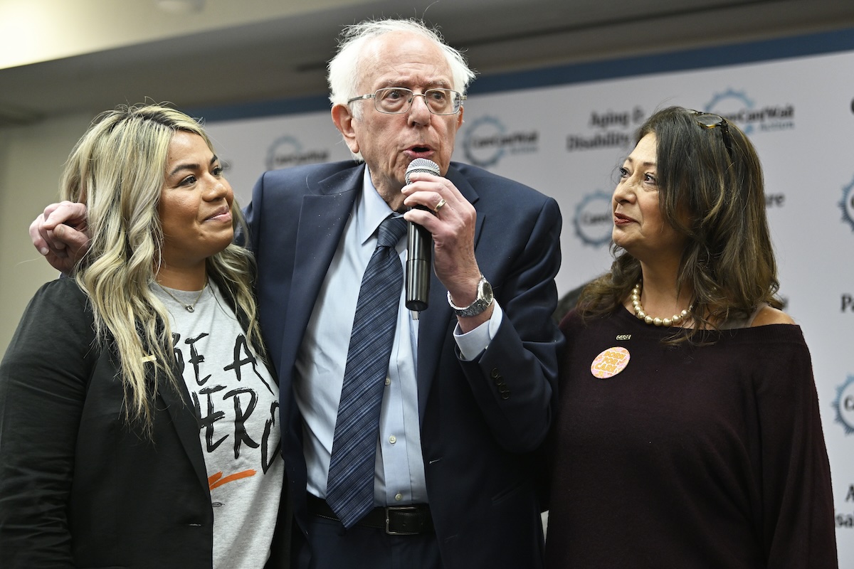 WASHINGTON, DC - APRIL 10: (L-R) Caregiver Izamar Barrios, U.S. Senator Bernie Sanders, and Gabriela Guerrero, member of the United Domestic Workers/AFSCME Union in California, speak at the Care Can't Wait Congressional Town Hall on April 10, 2024 in Washington, DC. (Photo by Shannon Finney/Getty Images for Care Can't Wait Action)